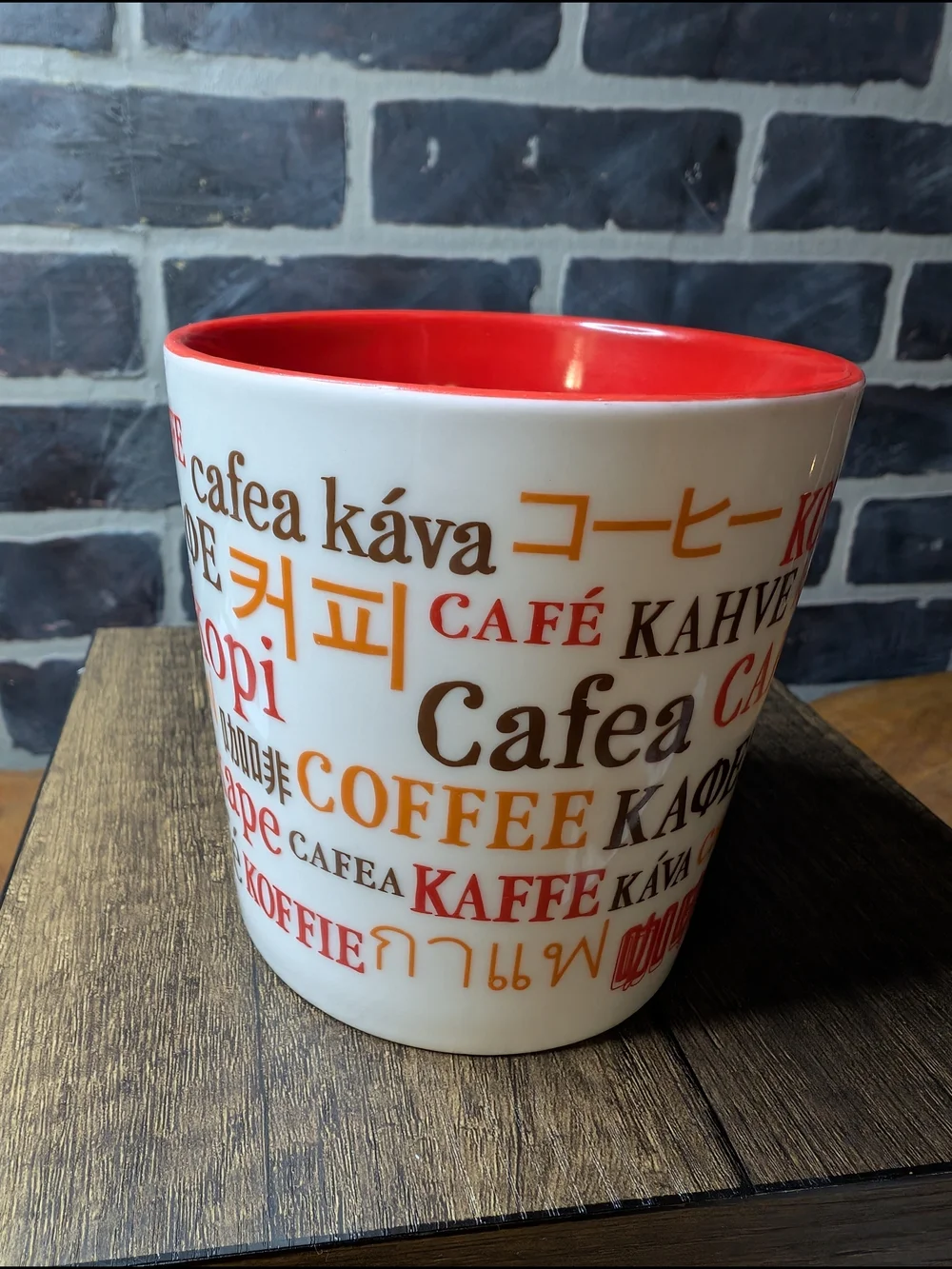 White and Red Coffee Mug with Multilingual 'Coffee' Design